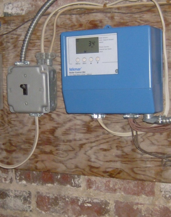 Modern apartment boiler controls.
