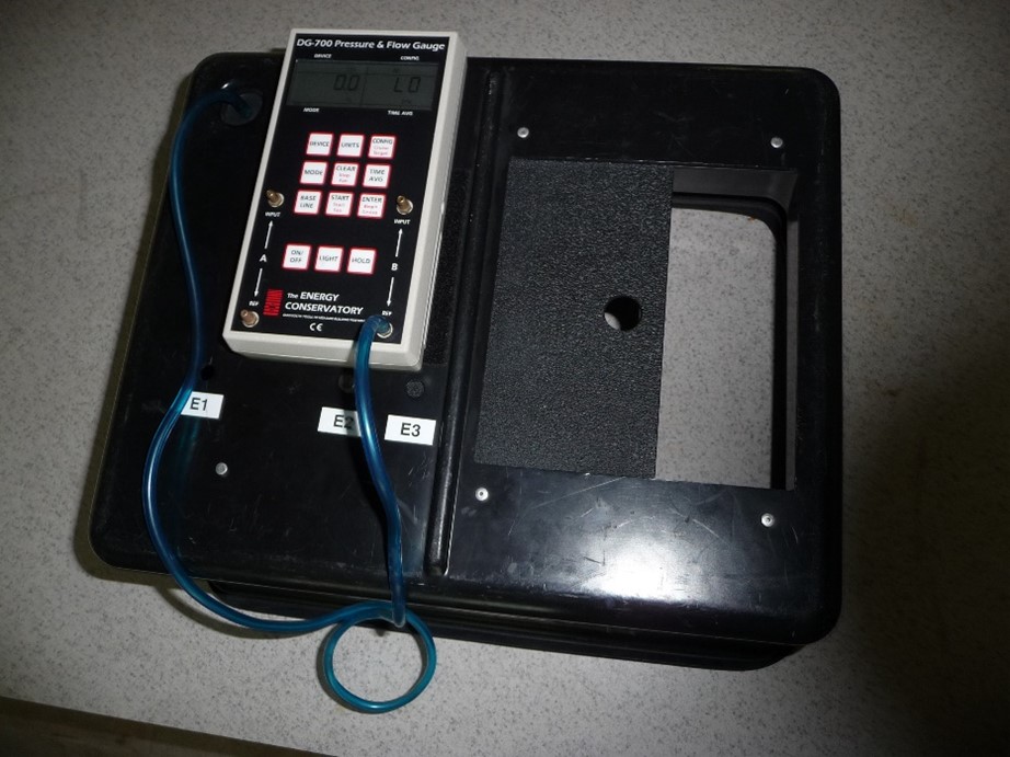 An exhaust fan flow meter and manometer are used to measure air flow at air inlet terminals with airflow up to about 120 cfm (Source: FSEC).