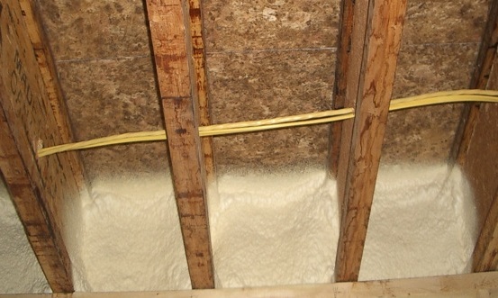 Spray foam at band joist.
