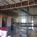 Right – Spray foam insulates the walls and ceilings separating the garage from the home.