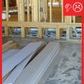 Wrong - No air barrier is present between the garage and floor system.