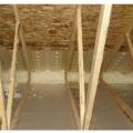 Right - Spray foam insulation air-seals the ceiling-to-drywall seams at the wall top plate.